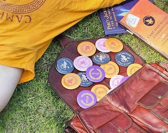 Botones del Campamento Mestizo / PJO