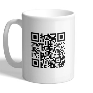 May include: White ceramic mug with a black and white QR code printed on the front.