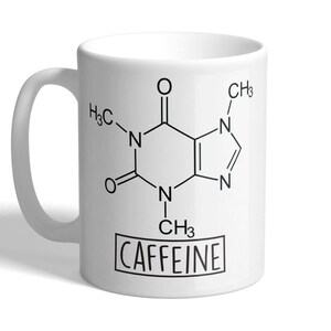 May include: White ceramic mug featuring a black and white illustration of the chemical structure of caffeine with the word "CAFFEINE" printed below.