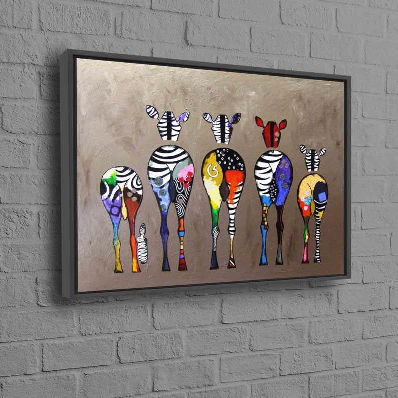 May include: A colorful painting of seven zebras standing in a row, facing away from the viewer. Each zebra has a unique pattern of black and white stripes, with splashes of bright colors like red, yellow, blue, and green. The zebras are painted on a light brown background.
