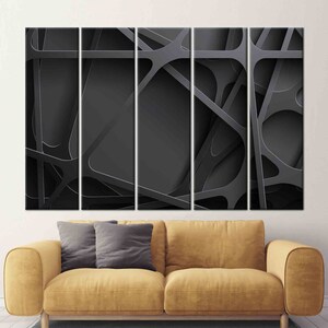 May include: Abstract art print featuring a black and gray geometric design with overlapping lines and shapes. The print is divided into five panels.