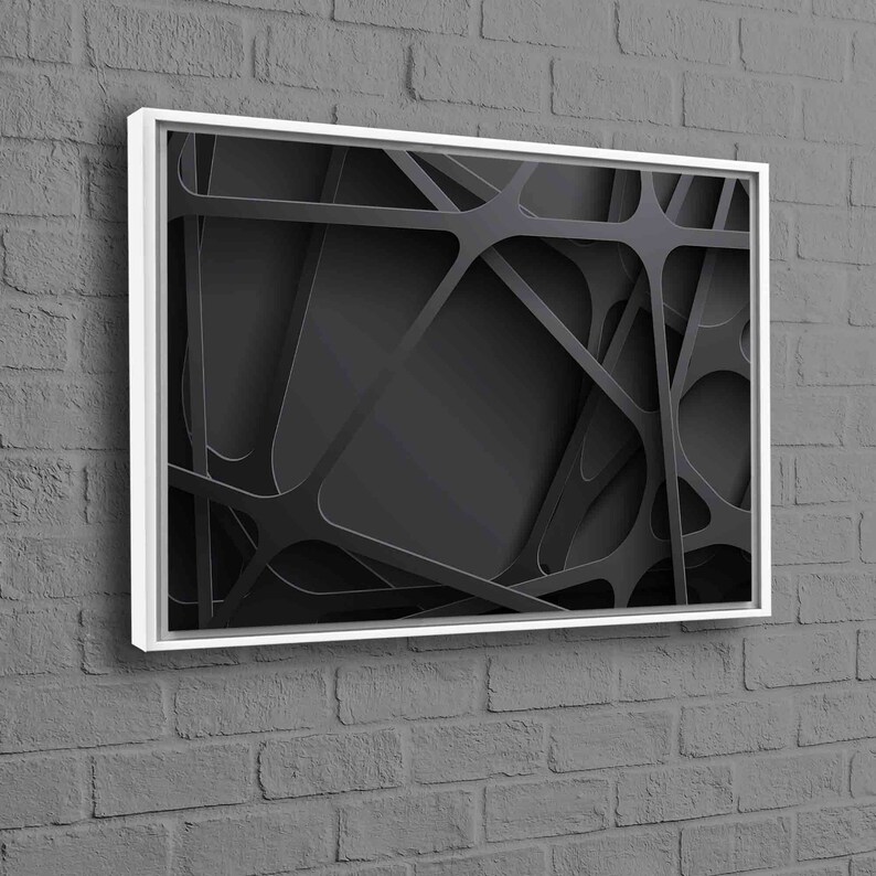 May include: Black and white abstract geometric design framed in a white frame. The design features overlapping lines and shapes creating a 3D effect.
