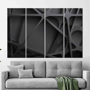 May include: Abstract art print featuring a black and white geometric design with overlapping lines and shapes. The print is divided into four panels.