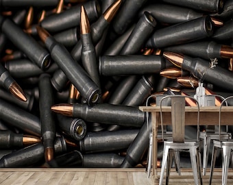 May include: A close-up of a pile of black and copper-colored bullets. The bullets are scattered, with their copper tips visible. The image suggests a theme of weaponry or ammunition.