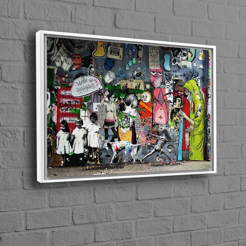 May include: A colorful and abstract wall mural with a variety of images and text. The mural features a mix of human figures, animals, and geometric shapes. The text includes the words "Welcome to Bushwick" and "It's not easy".