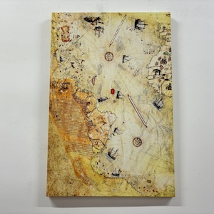 May include: An antique nautical map with a faded, yellowed background. The map features a compass rose, lines of longitude and latitude, and several ships drawn in red and black ink.