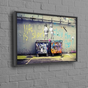 May include: A street art image with two figures in a graffiti alley. The figures are standing in front of two large metal garbage bins. The graffiti on the wall reads "Life is short chill the f*** out".