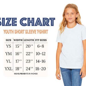 a young girl standing next to a size chart for a youth short sleeve t-shirt. The chart provides measurements for different age groups, including sizes YS, YM, YL, and XL, as well as fit sizes for width, length, and fit.