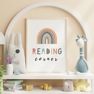 May include: A white shelf with a rainbow and the text "READING corner" on a framed print. The shelf is decorated with stuffed animals, books, and toys.