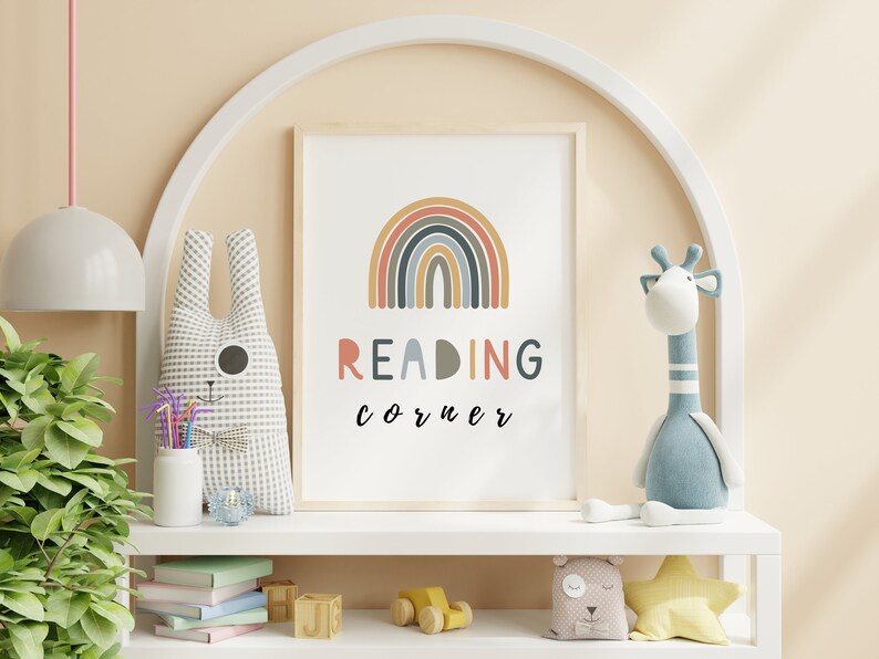 May include: A white shelf with a rainbow and the text "READING corner" on a framed print. The shelf is decorated with stuffed animals, books, and toys.