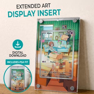May include: A clear acrylic display insert for a trading card, featuring a colorful illustration of a Ralts card. The display insert has the text "EXTENDED ART DISPLAY INSERT" and "DIGITAL DOWNLOAD INCLUDES PSA FIT". The card is displayed in a clear acrylic case.