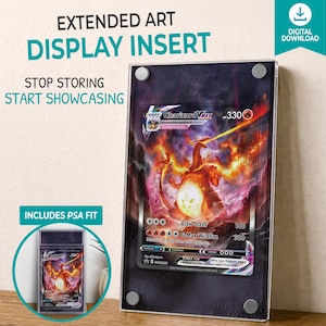 May include: A clear acrylic display insert for a trading card, featuring a Charizard VMAX card. The display insert has the text "EXTENDED ART DISPLAY INSERT" and "STOP STORING START SHOWCASING". Includes PSA fit.