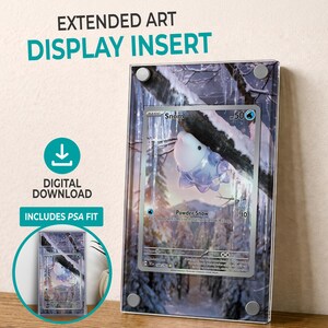 May include: Clear acrylic display insert for a trading card, featuring a winter scene and a Snom Pokémon card. The text "EXTENDED ART DISPLAY INSERT" and "DIGITAL DOWNLOAD" are visible. Includes PSA fit.
