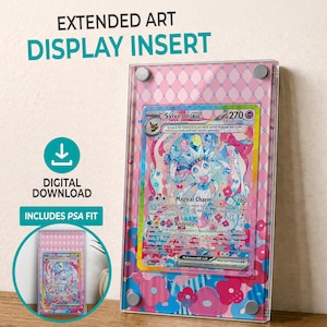 May include: A clear acrylic display insert for a trading card, featuring a Sylveon card with a colourful illustration. The display has a pink floral and diamond pattern. Text on the display reads "EXTENDED ART DISPLAY INSERT" and "DIGITAL DOWNLOAD".