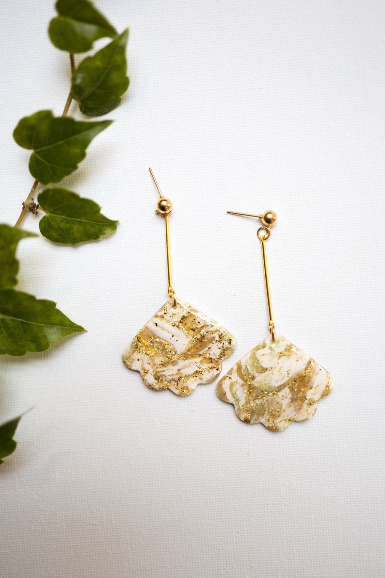 We are Golden Pendulum Earrings image 1