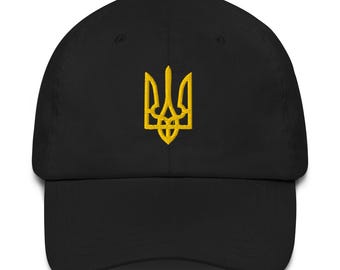 May include: Black baseball cap with a yellow embroidered trident emblem. The cap has a curved brim and an adjustable strap at the back. The emblem is a stylized trident, a symbol of Ukraine.