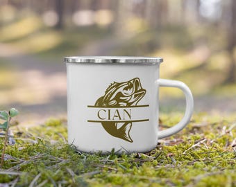 May include: White enamel camping mug with a brown bass fish graphic and the name "CIAN" printed on it.