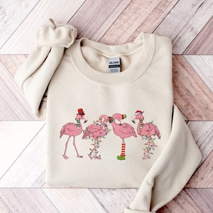 Flamingo Sweatshirt, Christmas Flamingo Shirt, Pink Flamingo Christmas Shirt, Christmas Shirt, Gift For Christmas,Santa Flamingos Gift Shirt