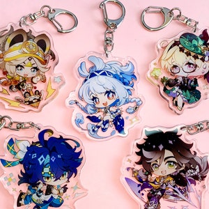 May include: Five colorful anime character keychains with silver key rings. The keychains are made of clear acrylic and feature different characters from the popular anime Genshin Impact. The characters are depicted in a chibi style, with large heads and small bodies. The keychains are perfect for fans of the anime and make a great gift for any occasion.