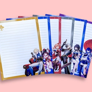 May include: Set of six lined notepads featuring anime characters from the video game Genshin Impact. The notepads have gold, red, blue and grey borders. The text "Adventure" is printed on the bottom of the gold notepad.