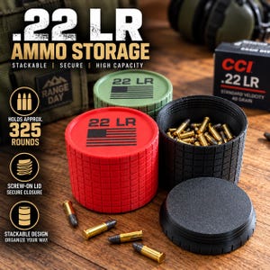 May include: Three cylindrical .22 LR ammo storage containers in red, green, and black with a grid-textured exterior. Each lid features the text .22 LR and a flag graphic. The black container is open, revealing brass-cased ammunition inside.