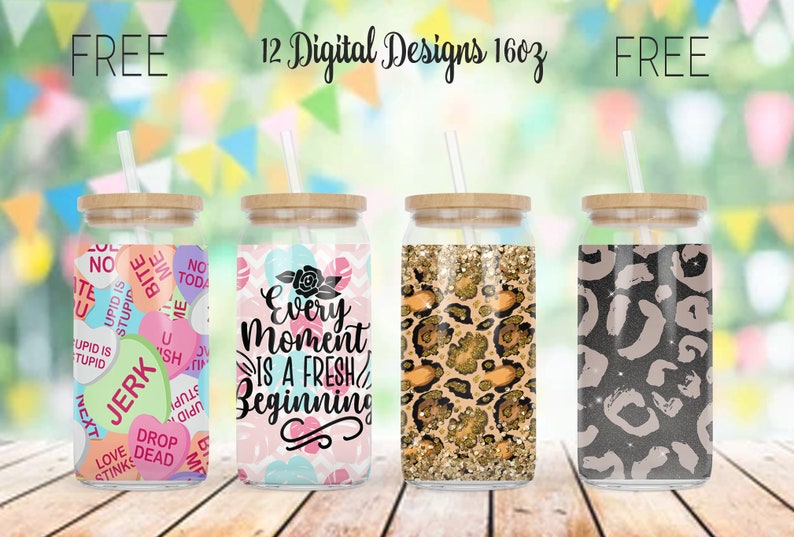 May include: Four glass tumblers with bamboo lids and straws. Designs include conversation hearts, floral, leopard print, and a gray leopard print. Text on the tumblers reads "FREE 12 Digital Designs 16oz FREE" and "Every Moment Is A Fresh Beginning."