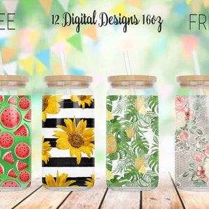 May include: Four glass tumblers with bamboo lids and straws, each featuring a unique design. Designs include watermelon slices, sunflowers on black and white stripes, tropical leaves, and floral patterns. The text "FREE 12 Digital Designs 16oz FREE" is at the top.