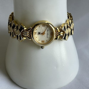 Vintage Gloria Vanderbilt Watch: Black & White Enamel Bow, 7" image 1