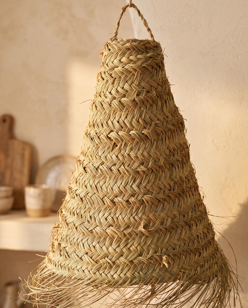 Suspension en feuille de palmier avec franges