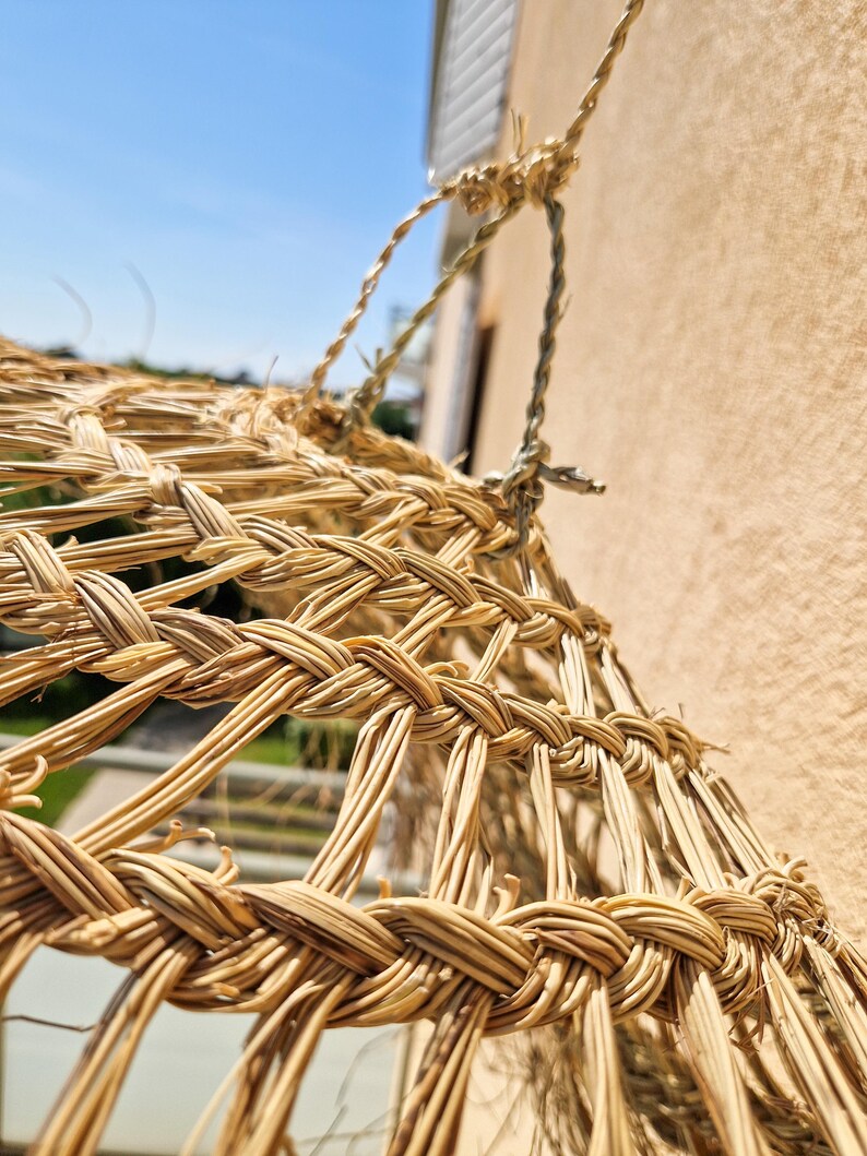 Suspension Parasol Ajourée en Fibre Naturelle