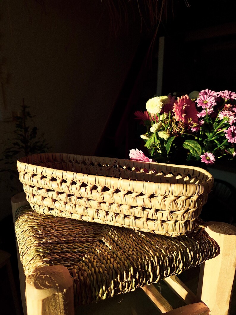 Panier tressé à la main en feuilles de palmier