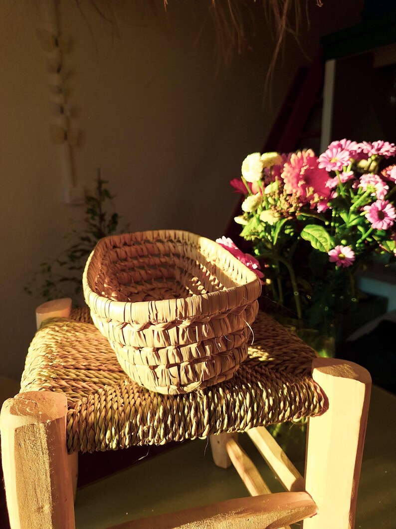 Panier tressé à la main en feuilles de palmier