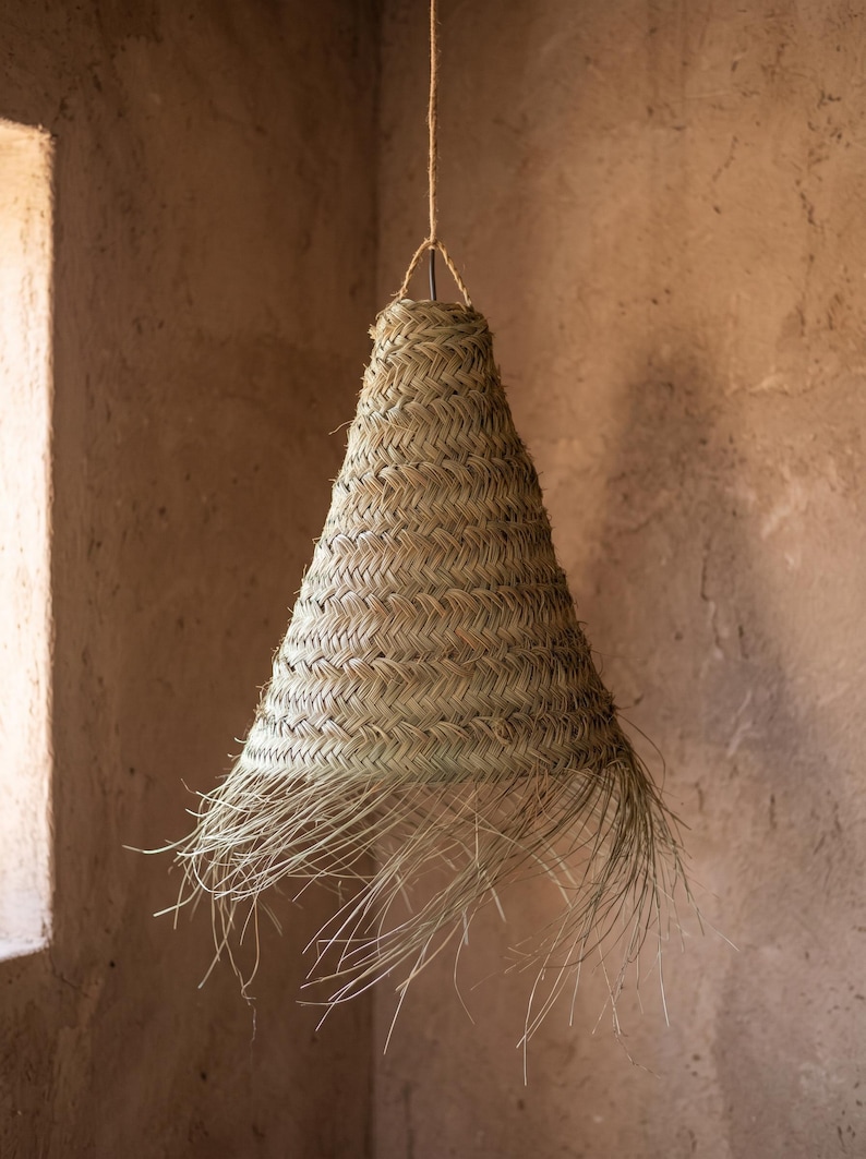 Suspension en feuille de palmier avec franges