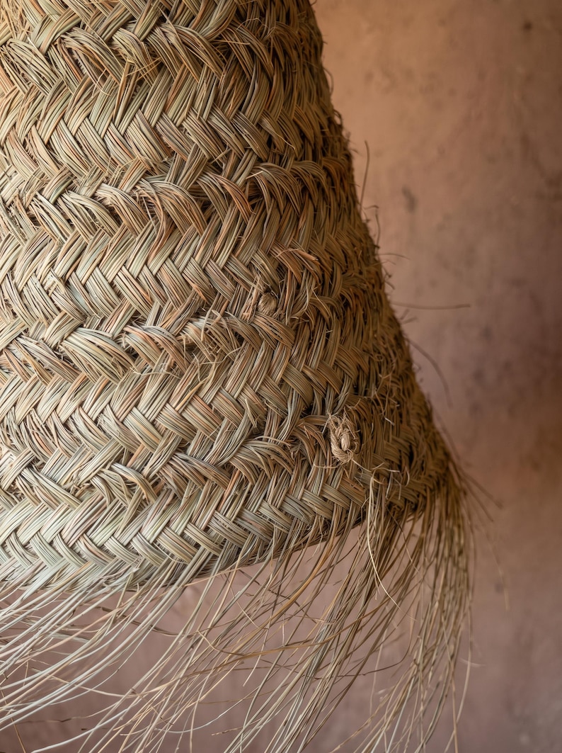 Suspension en feuille de palmier avec franges