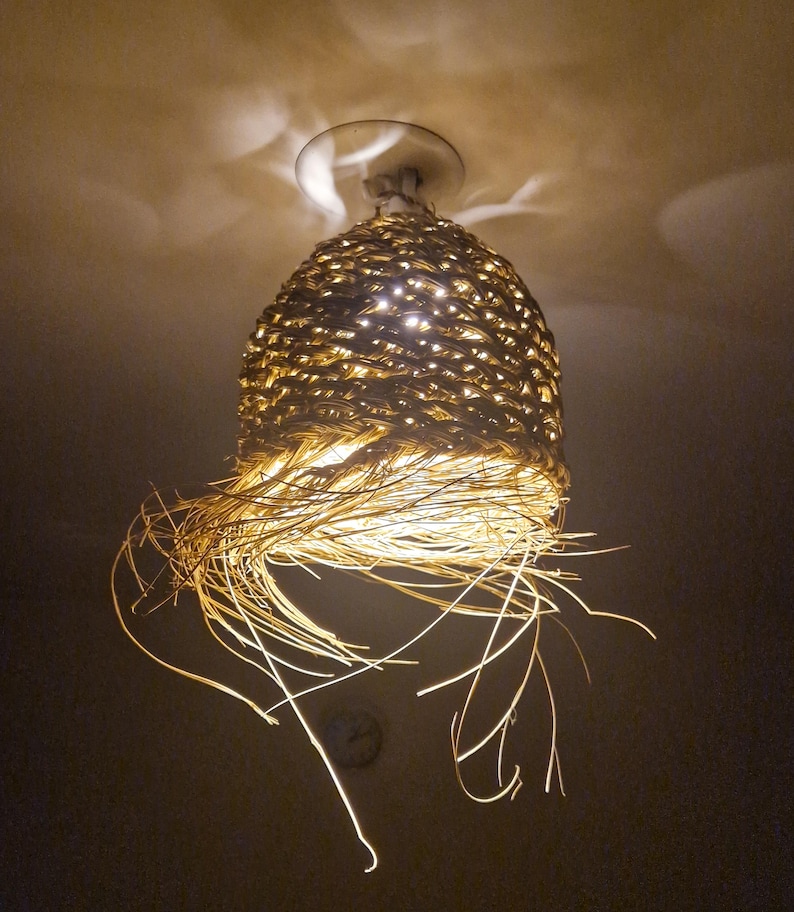 Suspension nid d'abeille en feuille de palmier