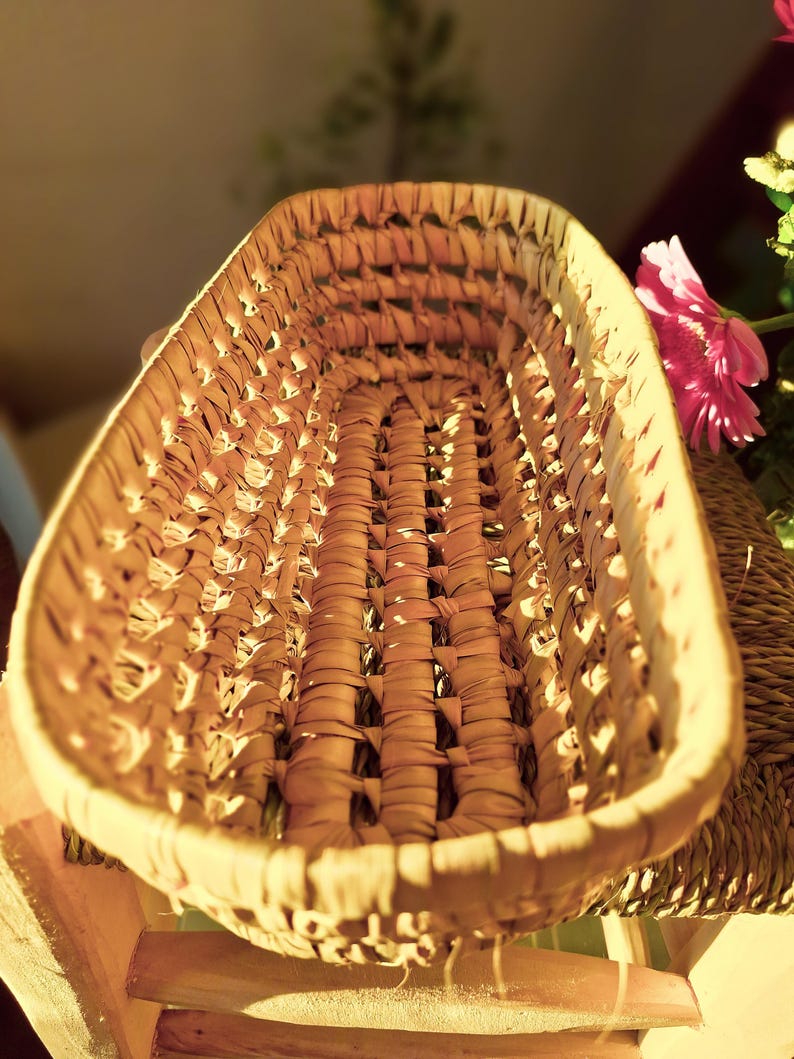 Panier tressé à la main en feuilles de palmier