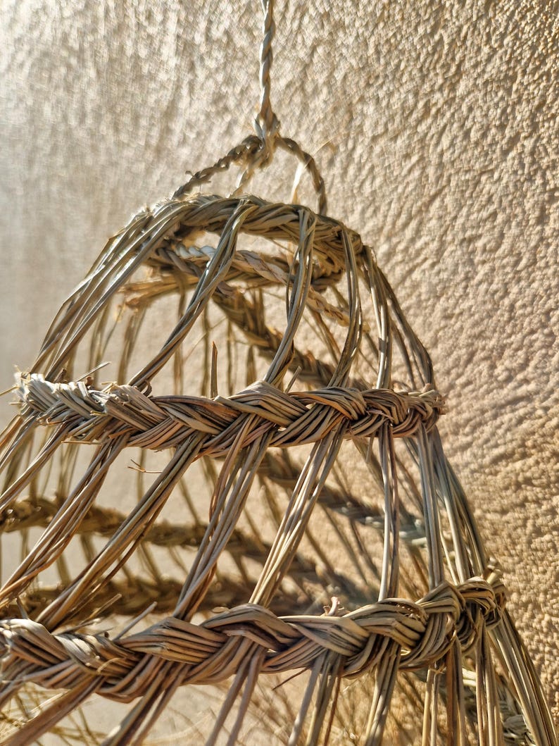 Suspension conique ajourée en feuilles de palmier