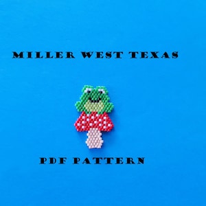 May include: A beaded frog figurine with a red and white mushroom base, set against a bright blue background. The text "MILLER WEST TEXAS" and "PDF PATTERN" are displayed in black.