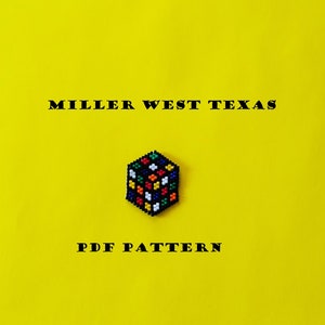 May include: A PDF pattern for a beaded Rubik's Cube, with the text "MILLER WEST TEXAS" and "PDF PATTERN" on a yellow background.