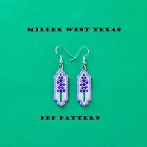 May include: Handmade beaded earrings with a lavender flower design. The earrings feature a white, purple, and green color scheme. The text "MILLER WEST TEXAS" and "PDF PATTERN" are printed on a green background.