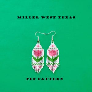 May include: A pair of beaded earrings with a floral design in pink, white, and green, against a green background. The earrings have silver hooks and the text "MILLER WEST TEXAS" and "PDF PATTERN".