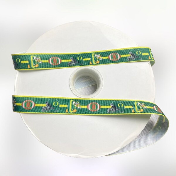 Oregon Inspired sports team 7/8” grosgrain ribbon. College inspired grosgrain ribbon. Ducks inspired ribbon. DIY craft supply ribbon.