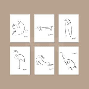 May include: Six minimalist art prints with black line drawings of a dove, dachshund, penguin, flamingo, cat, and elephant on a white background. Each print is signed "Picasso" at the bottom.