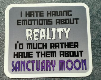 May include: A square sticker with a white border and a gray background. The sticker has the text "I HATE HAVING EMOTIONS ABOUT REALITY I'D MUCH RATHER HAVE THEM ABOUT SANCTUARY MOON" in black and purple.