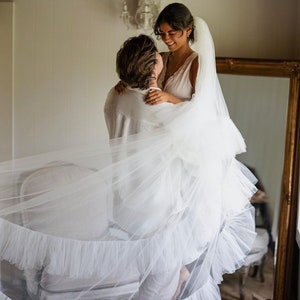 Veil ruffles and blush, two-tiered veil with ruffles along the edge of a veil made of soft tulle, a trend of 2024 image 2