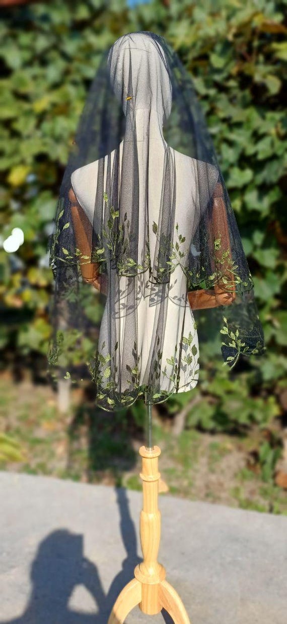 Chic Black Veil with Green Leaves and Metal Comb Attachment .Black wedding veil with green leaves in two tiers to cover the face.