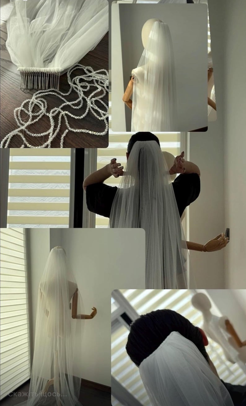 May include: A white bridal veil with a comb and beaded accents. The veil is long and flowing, and is shown on a mannequin and being worn. The veil is made of a sheer, lightweight fabric.