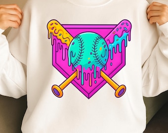 May include: White sweatshirt featuring a baseball-themed graphic. The design includes a teal baseball, crossed yellow bats, and a pink home plate shape. The baseball and bats have a dripping, melted effect with yellow and blue accents.