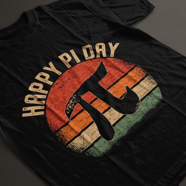 May include: Black t-shirt with a vintage-style graphic of a pie symbol and the text "Happy Pi Day".