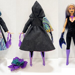 May include: A fashion doll with purple hair and matching accessories. The doll wears a black jumpsuit, purple boots, and a black coat with a colorful zebra print lining. A purple handbag and a decorative flower are also included.